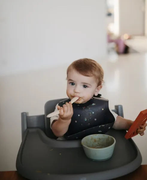 Mushie Silicone Baby Bib | Planets
